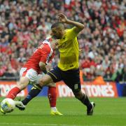 Liam Sercombe drives upfield during Oxford United's 3-2 defeat to Barnsley in the Johnstone's Paint Trophy final Picture: David Fleming