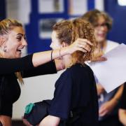 Pupils embrace on A-Level results day at The Cherwell School