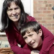 Andrew Baker, pictured with his mum