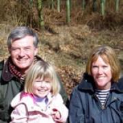Poppy with mum Georgie and dad James