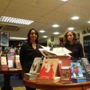 Staff Salma Caller, right, and Natalia de la Ossa are looking forward to the Blackwell's Christmas Family Day