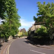 Beauchamp Lane in Cowley pictured in spring sunshine last week