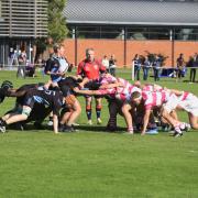Abingdon School (right) take part in a rugby scrum