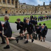 Pupils at Christ Church Cathedral school make their way through Christ Church College