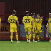 Cameron Brannagan is congratulated after scoring for Oxford United at Cheltenham Town  Picture: David Fleming