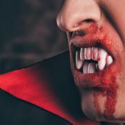 fangs and blood of a close-up. Halloween. getty