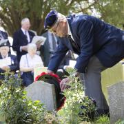 Major John Howard's cousin Derek Chivers lays a wreath at his grave in Clifton Hampden in 2017 Picture Damian Hailliwell