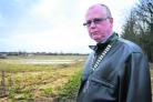 Grove Parish Council chairman Frank Parnell at the Grove Airfield site