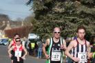 Jake Shelley (right) leads the Bourton 10K