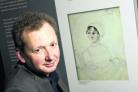 Exhibition curator Stephen Hebron with the accepted portrait of Jane Austen. Picture: OX50613 Antony Moore