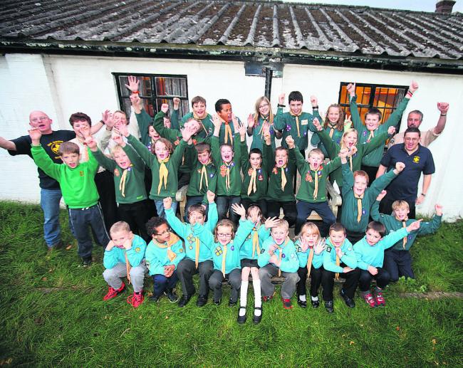 Scout group members celebrate news of their Lottery Fund win