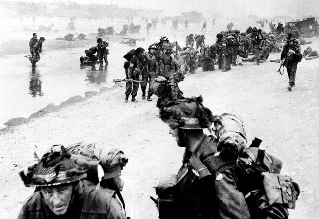 The First Bucks, a territorial battalion of the Oxfordshire and  Buckinghamshire Light Infantry, land on Sword Beach on June 6 1944.