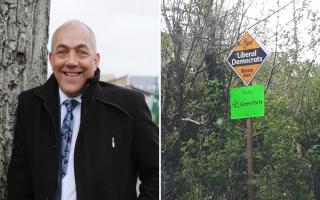 Councillor Andy Graham and a Liberal Democrat/ Green Party banner