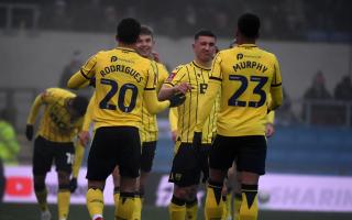Oxford United players celebrate against Grimsby Town