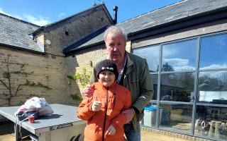 Jeremy Clarkson made a very special visit to meet a young fan at the farm.
