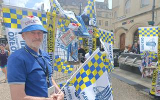 Bill Hardiman was selling flags and scarves on Cornmarket Street.