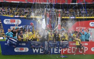 Oxford United players celebrate at Wembley