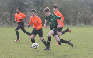 Combe’s Joseph Worsfold outpaces the Littlemore midfield during his side's 3-0 defeat in the Under 13 B League Picture: Steve Wheeler