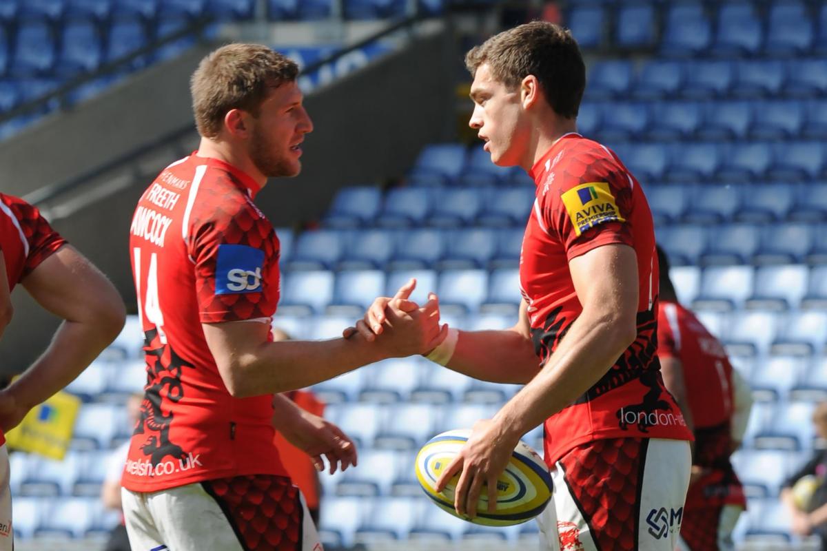 Chris Elder (right) is congratulated by Alan Awcock after scoring and converting a try