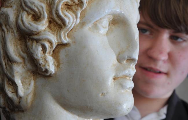 Cheney School pupil Barnaby Evans, 14, with a bust of Alexander the Great