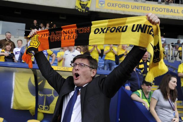 Darryl Eales cannot hide his delight after the 3-0 success over Wycombe Wanderers on the final day of the season achieved their ambition – promotion to League One