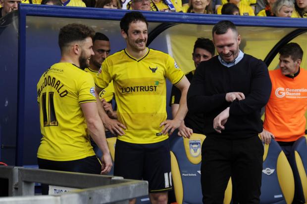 Michael Appleton checks his watch as the final game of the season against Wycombe Wanderers enters injury time, waiting for the celebrations to start as the U’s clinch promotion