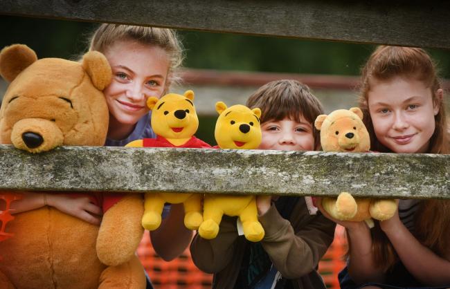 The World Pooh Sticks Championships in Witney. Pictured is Fleur Edwards (12) Alexander Edwards (6), and Megan Harrison (12). Picture: Richard Cave Photography
