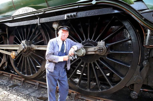 Oxford Mail: Grahame Dryden a volunteer at Didcot, was on the footplate as The Flying Scotsman arrived. Picture: Ric Mellis