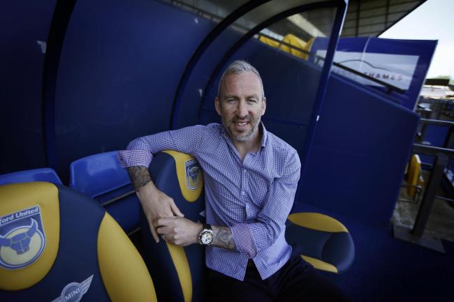 SETTLING IN: Shaun Derry takes his place in the Oxford United dug-out after being unveiled as the club’s new first-team coachPicture: Ed Nix