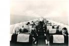 Passengers relax in a Concorde en route to Bahrain