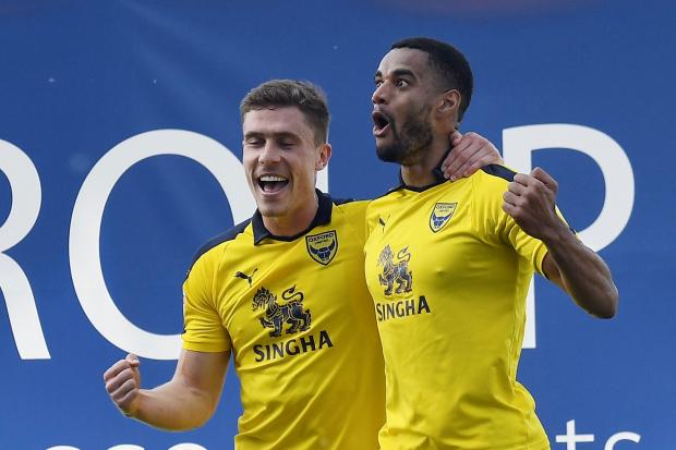 Curtis Nelson (right) celebrates his goal for Oxford United  Picture: David Fleming