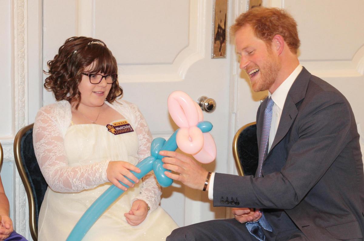 Mikayla Beames meeting Prince Harry when she received a National WellChild Award in October 2016. 